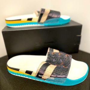 RAF Simons Adidas Sambda Adilette slides.